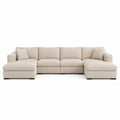 Canapé modulaire en tissu beige avec méridiennes